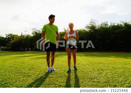 Couple Working out in the Singapore Park Couple Working out in the Singapore Park 15225448