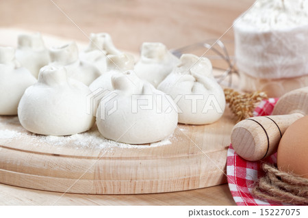 Baking ingredients for cooking manti dumplings. 15227075