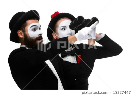 Two memes as business people looking through binoculars Two memes as business people looking through binoculars 15227447