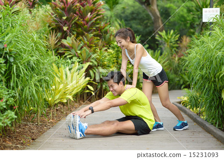 Young Chinese couple doing stretching exercise 15231093