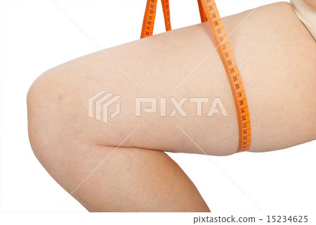 Fat woman measure her leg Fat woman measure her leg 15234625