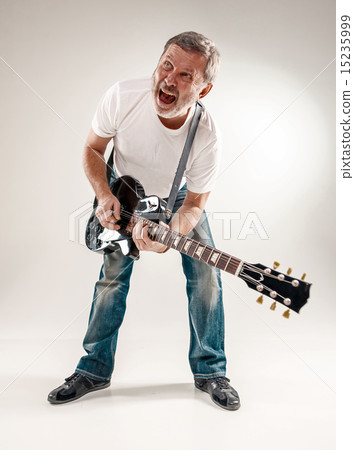 Full length portrait of a guitar player Full length portrait of a guitar player 15235999