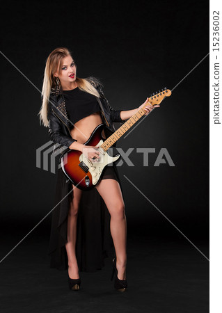 Beautiful girl playing guitar Beautiful girl playing guitar 15236002