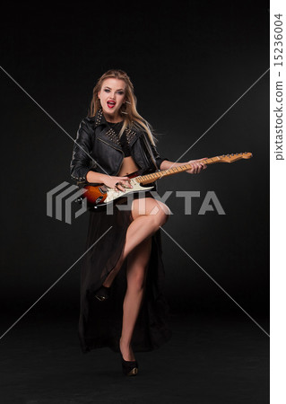 Beautiful girl playing guitar Beautiful girl playing guitar 15236004