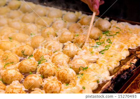 Takoyaki is turned over 15270493