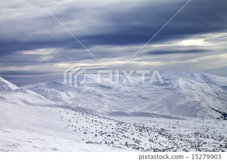 Winter mountains and gray sky Winter mountains and gray sky 15279903