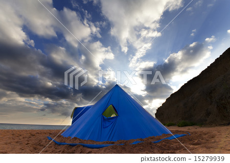 Conical tent on summer beach in evening Conical tent on summer beach in evening 15279939