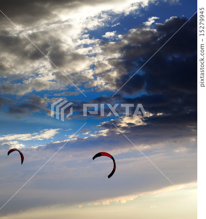 Two silhouette of power kites at sunset sky 15279945