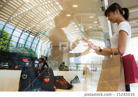 Women shopping in Singapore mall Women shopping in Singapore mall 15283016