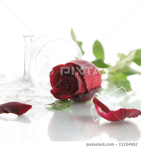 Red rose and broken glass of wine 15284982