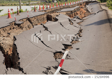 Cracked asphalt road 15284996