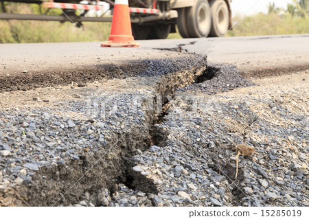 Cracked asphalt road 15285019