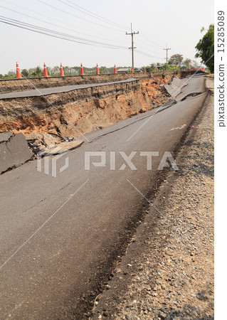 Cracked asphalt road 15285089