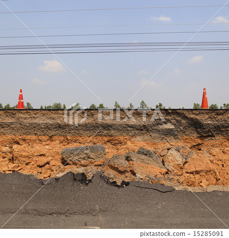 Cracked asphalt road 15285091