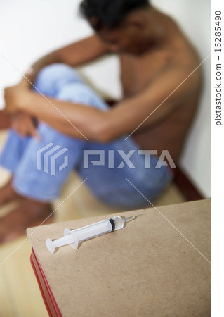 Syringe and drug addict 15285490