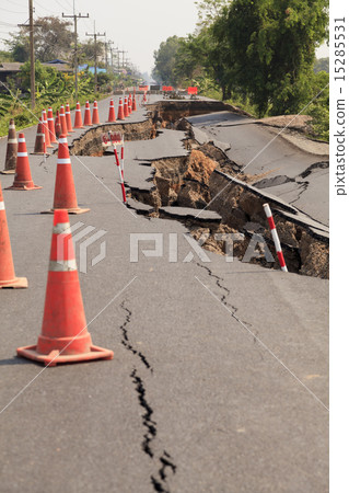Traffic cones on the cracked asphalt road Traffic cones on the cracked asphalt road 15285531