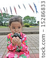 A girl who eats onigiri 15286833