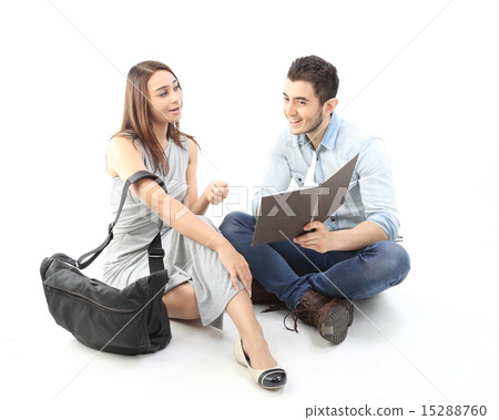 Male female sit on floor discuss talk Male female sit on floor discuss talk 15288760
