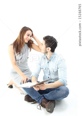 Male female sit on floor fun discuss talk Male female sit on floor fun discuss talk 15288765