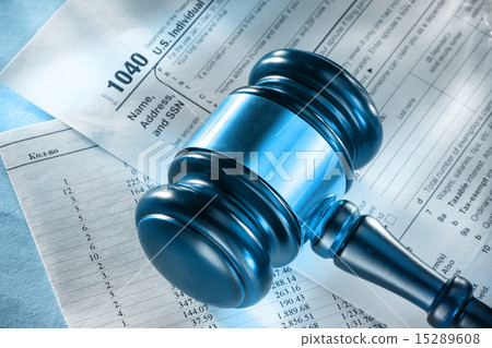 Annual budget, tax form and gavel 15289608