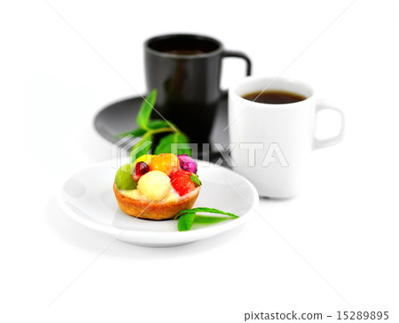 Small fruit cake and two cups of coffee Small fruit cake and two cups of coffee 15289895