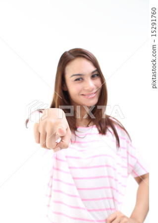 Female pointing at you smile focus on finger 15291760