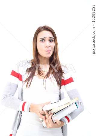Female carrying heavy book Female carrying heavy book 15292255
