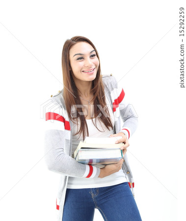 Female carrying heavy book  15292259