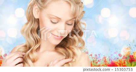 beautiful young woman face with long wavy hair beautiful young woman face with long wavy hair 15303753
