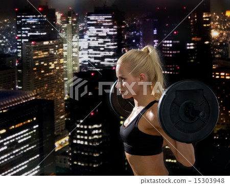 sporty woman exercising with barbell sporty woman exercising with barbell 15303948