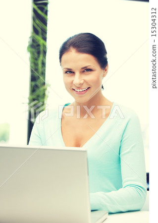 happy woman with laptop computer 15304312