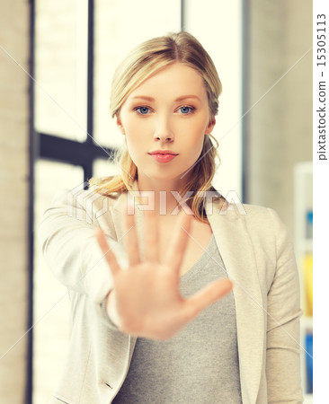 woman making stop gesture 15305113