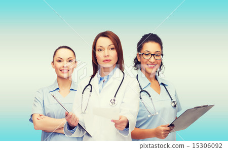 calm female doctor with clipboard calm female doctor with clipboard 15306092
