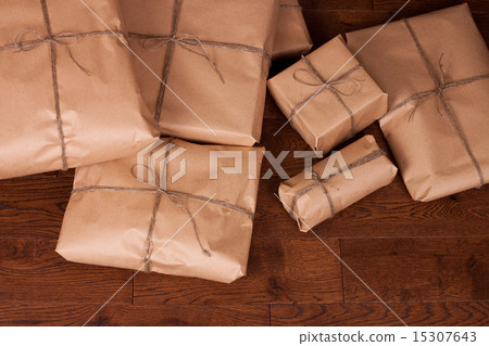 Vintage gift box package on wooden background. 15307643