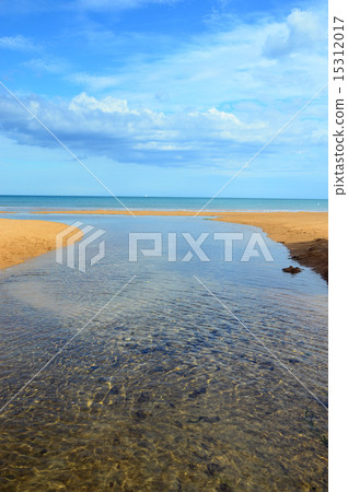 Brook flowing across the beach Brook flowing across the beach 15312017