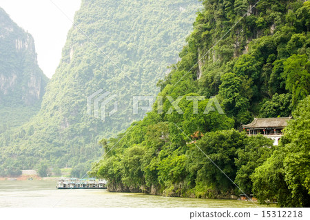 Chinese building in lush jungle 15312218