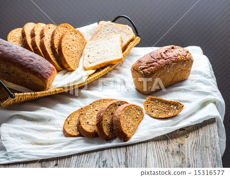 assortment of baked bread, slices of rye bread 15316577