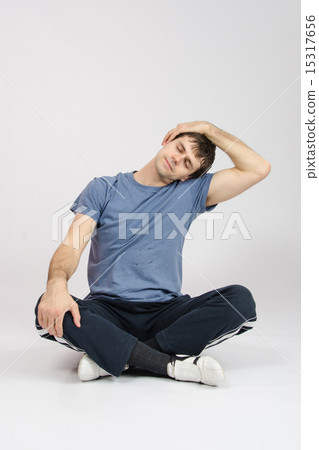 Athlete flexing muscles of the neck Athlete flexing muscles of the neck 15317656