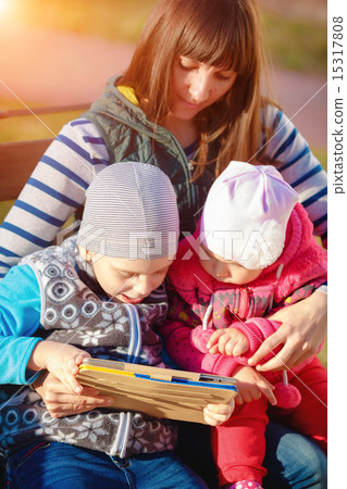 Happy family of three Happy family of three 15317808