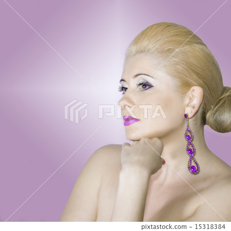 portrait of the face of the blonde on a pink background 15318384