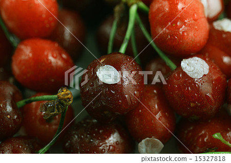 cherries in a bowl on the window 15327818