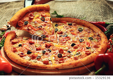 pizza with a slice cut, delicious pastries pizza with a slice cut, delicious pastries 15329136