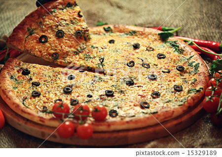 pizza with a slice cut, delicious pastries pizza with a slice cut, delicious pastries 15329189