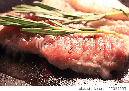 pork fried in a pan pork fried in a pan 15329365