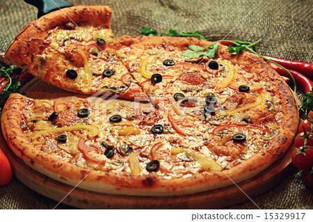 pizza with a slice cut, delicious pastries pizza with a slice cut, delicious pastries 15329917