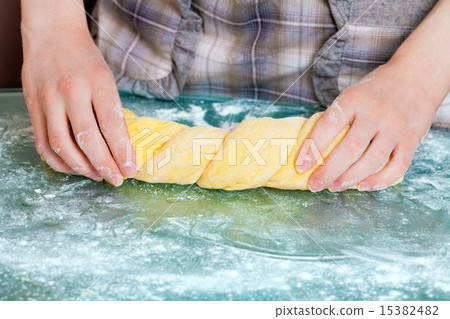 Female hands kneading yeast dough Female hands kneading yeast dough 15382482