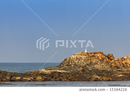 Rock on the GOA beach 15384228