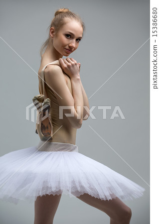 Portrait of young ballerina in white tutu 15386680