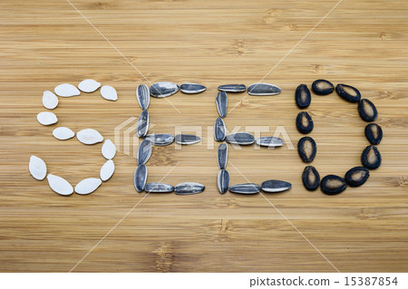 Variety of edible seeds written in word  15387854