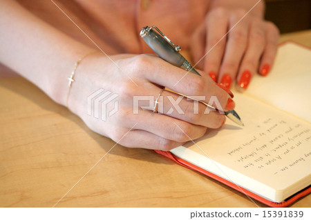 Write in a notebook Write in a notebook 15391839